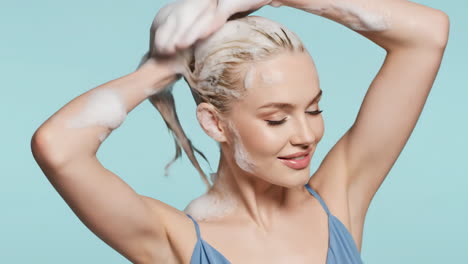 woman washing her hair with shampoo