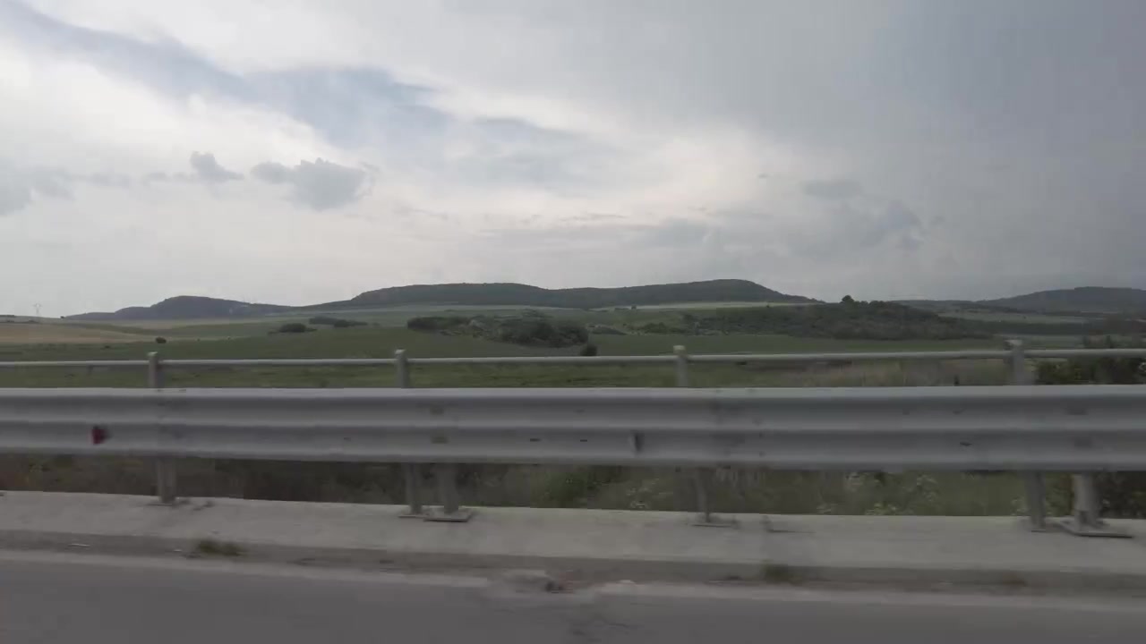 time lapse shot from a driving car looking out of the window