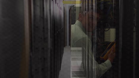 Animation-of-caucasian-man-checking-wires-over-server-room