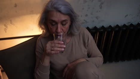 woman sitting on a chair at night