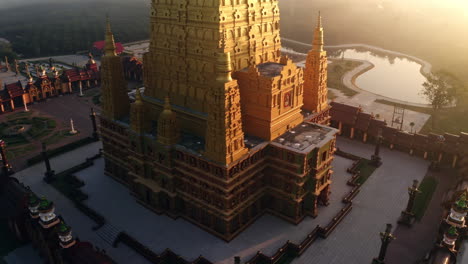 golden pagoda at sunrise - aerial view