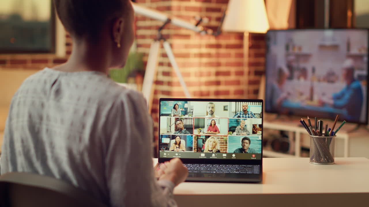 Woman attends videocall meeting