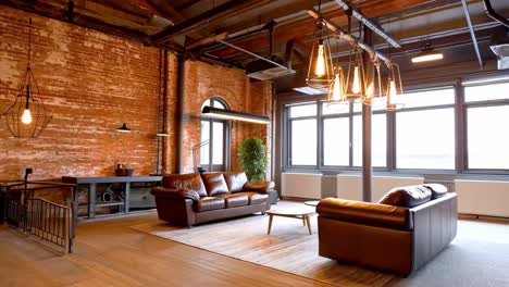 living room with brick wall and industrial lighting