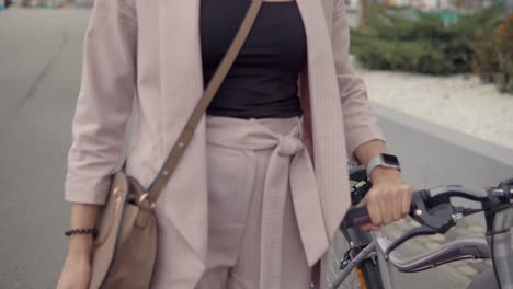 woman walking with bicycle