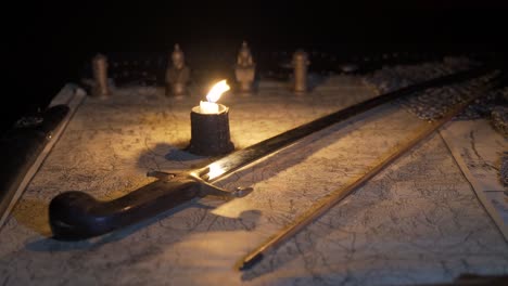 battle plan on a candlelit map in ancient times.