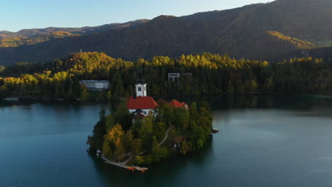 rotating drone shot of the pilgrimage church of the assumption of mary in slovenia