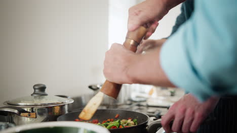 cooking vegetables in a frying pan