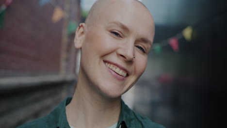 smiling bald woman