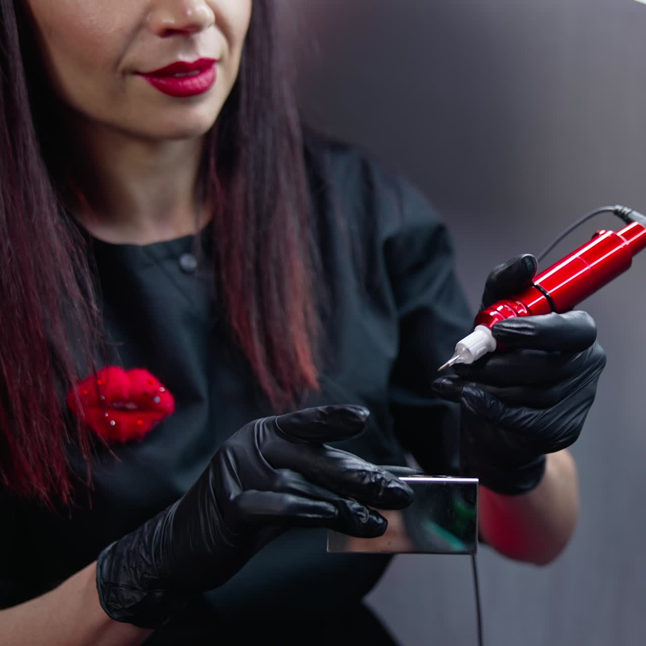 Pretty woman cosmetologist working with permanent make up. Close up view of cosmetology permanent technologies