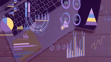 Animation-of-financial-data-processing-over-laptop-on-office-desk