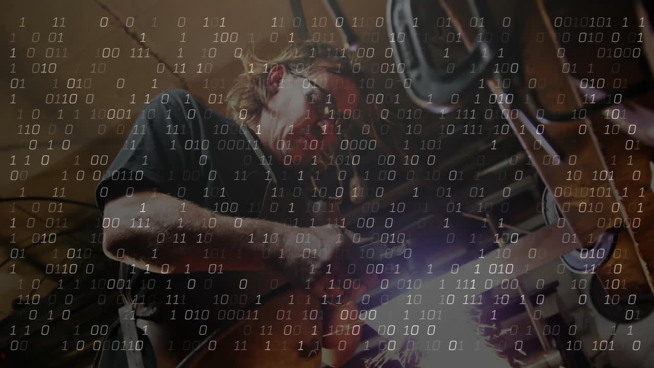 Metalworker grinding metal with angle grinder in factory, with animated sparks and data overlays