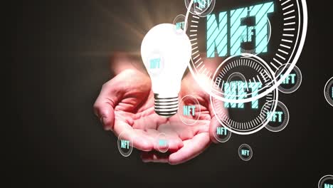 Animation of hand with light bulb and nft text over dark background