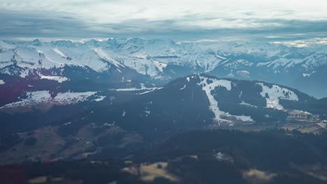 The-enchanting-landscape-of-the-Austrian-Alps-in-the-aerial-video---snow-covered-mountain-peaks-above-wide-valleys