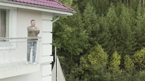 man on a balcony