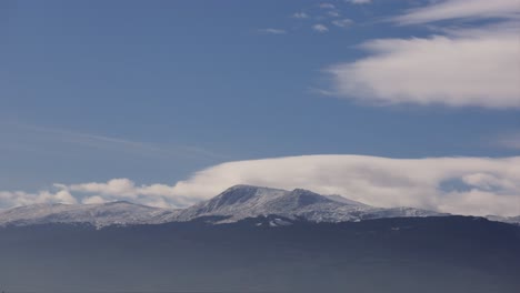 mountains time lapse of clouds passing over the snowy mountain top of vitosha, bulgaria