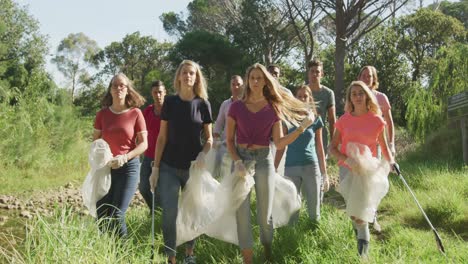 mid adults volunteering during river clean-up day