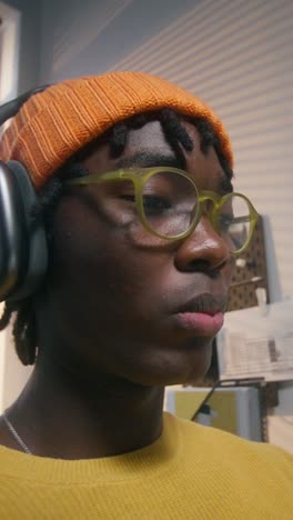 young person concentrating at a desk