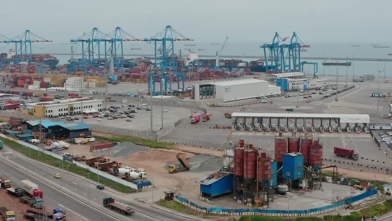 Cargo operations at the port in Accra, Ghana on a cloudy day