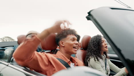 friends on a road trip in a convertible