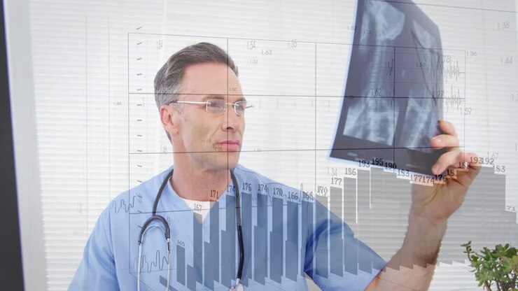 Doctor glancing monitor then lifting X-ray, diagnosing lung issue with animated grid overlays