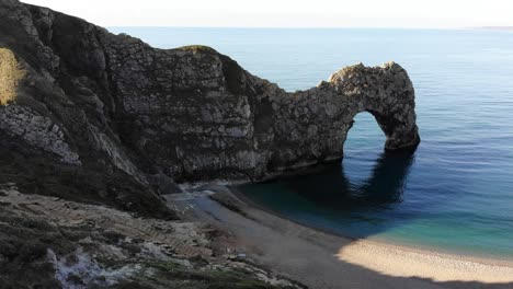 Aerial-Over-Beach-With-View-Of-Durdle-Door-In-Dorset