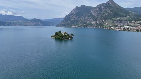 island of loreto north of monte isola , lake isola panning drone aerial