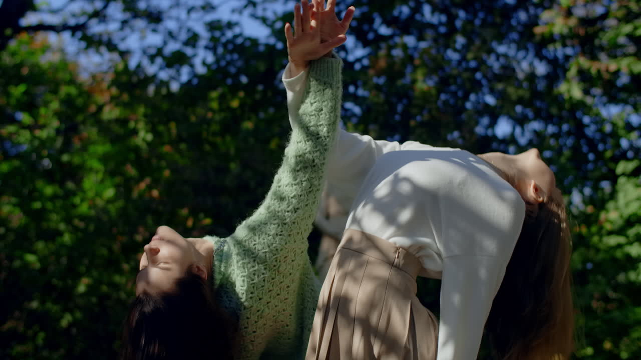 Two Women Posing in a Park