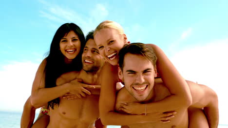 friends joking and having fun on the beach