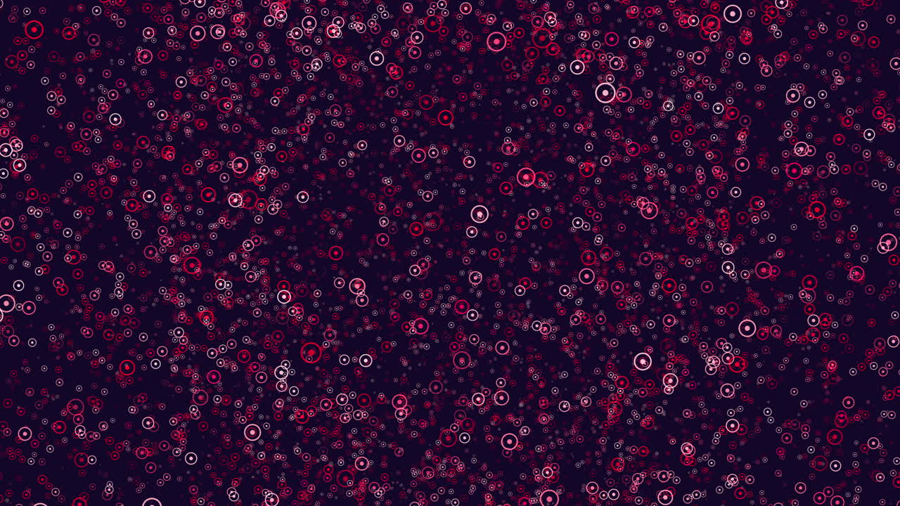 Bold red dot pattern on dark background in circular formation