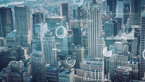 animation of screens with statistical data processing against aerial view of tall buildings