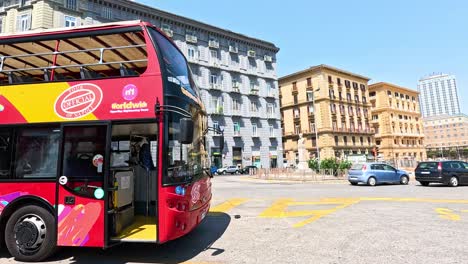 red double-decker bus in naples, italy