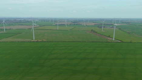 wind turbines harnessing renewable energy over england's fields