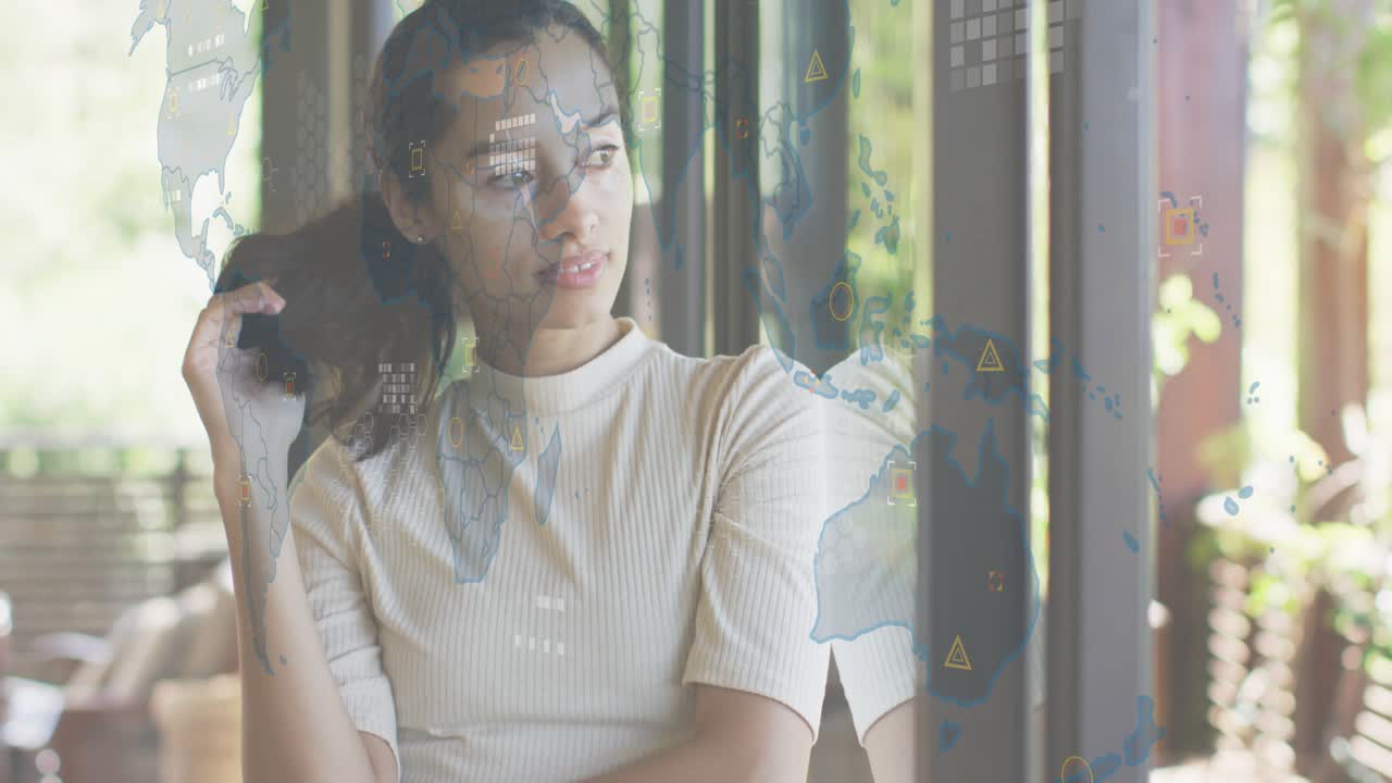 Woman leaning by glass door activating tech world map overlay while fixing hair for analyzing data