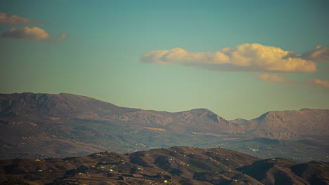 Deserted-landscape,-time-lapse-moving-clouds-transition-over-empty-valley