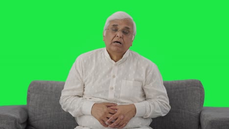 Sick-Indian-old-man-suffering-from-stomach-pain-Green-screen