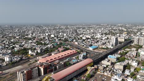 high-angle view of jaipur's dense housing and busy roadways.