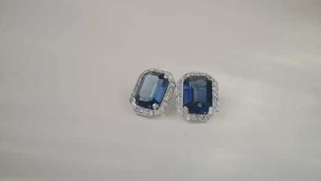 beautiful shiny blue sapphire diamond studded earrings -close up