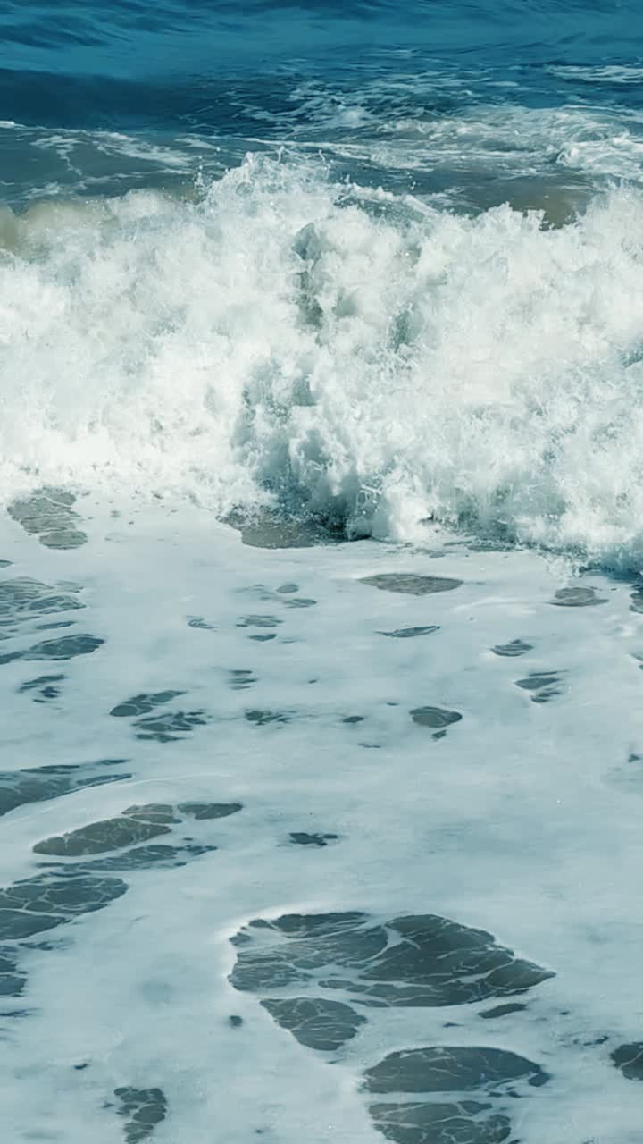 Dynamic Ocean Waves Crashing with White Foam and Spray