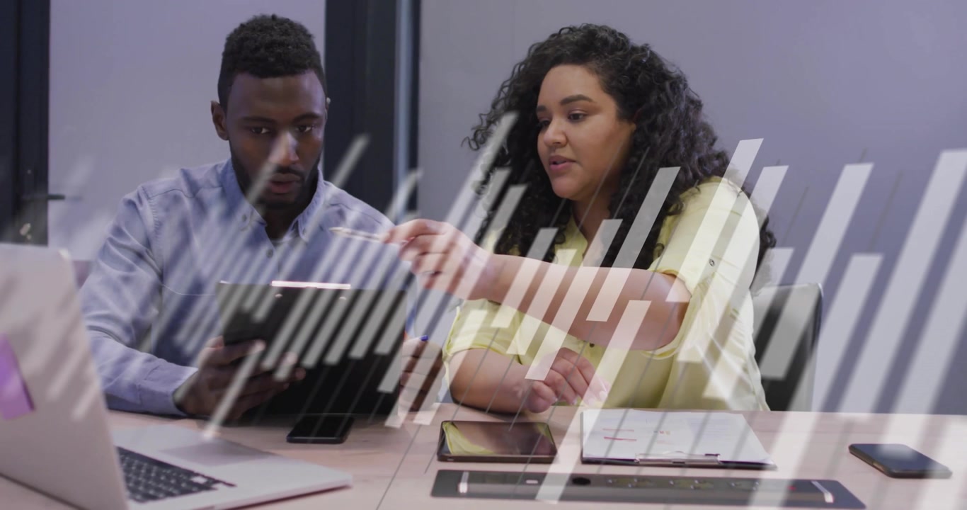Diverse Business Colleagues Discussing Data Analytics in Office Meeting
