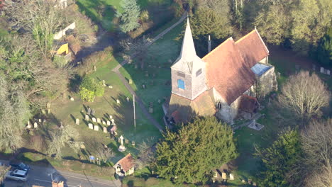 Aerial-view-of-St-Mary's-church-in-High-Halden-village,-located-in-Kent-UK