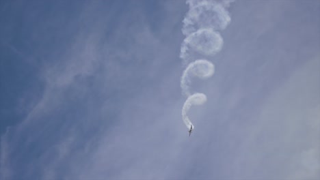 stunt plane doing aerobatics at airshow