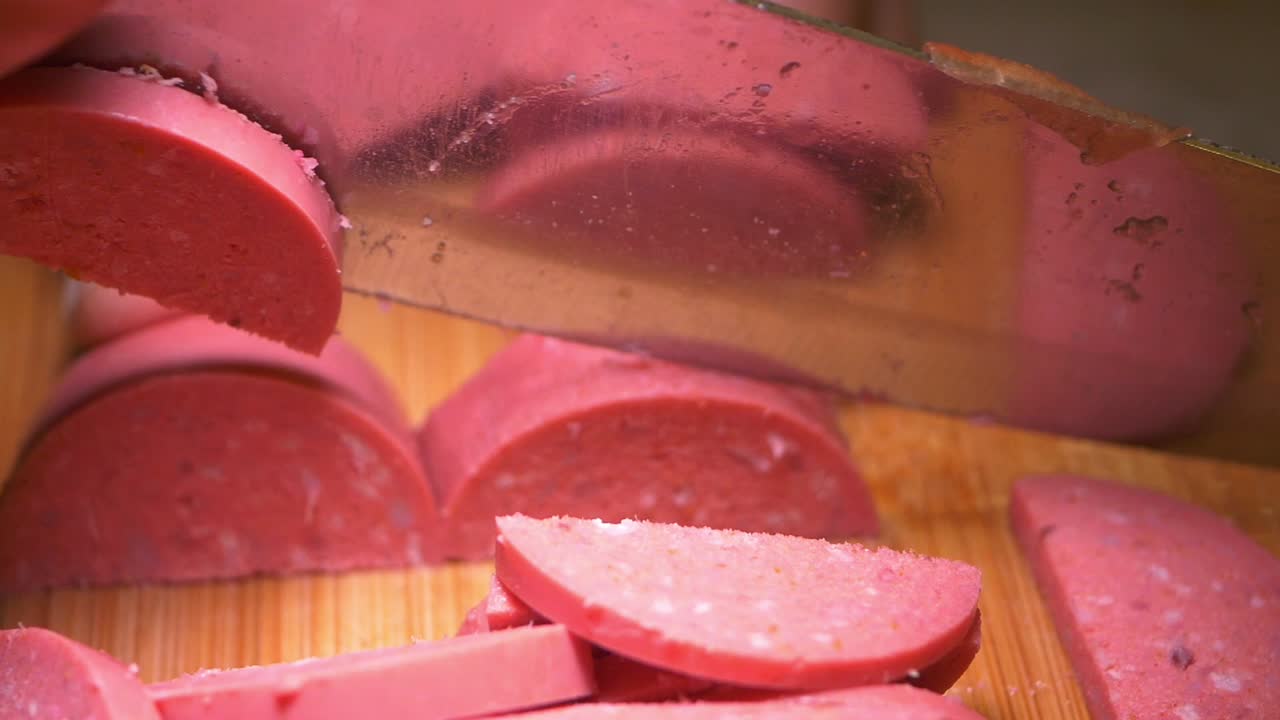 Slicing Pink Sausage