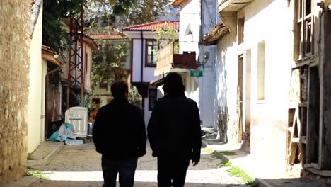 People-Walking-In-Old-City-Street