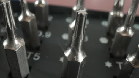 Tools-bit-set-for-repair-of-smartphones-and-computer-equipment-close-up.