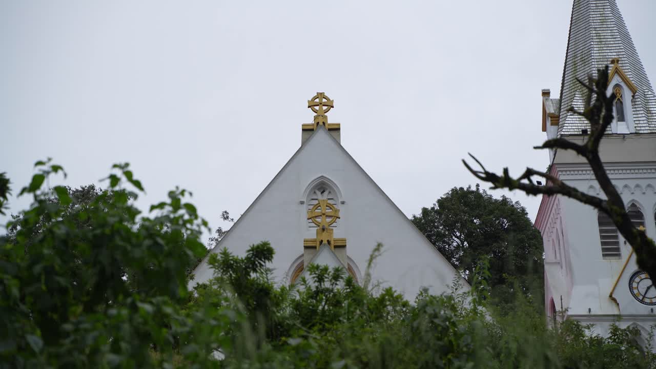 There is a church on the top of the mountain. It is located in Darjeeling