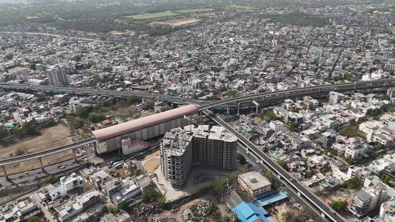 Overhead shot of Jaipur's busy traffic and flyovers.