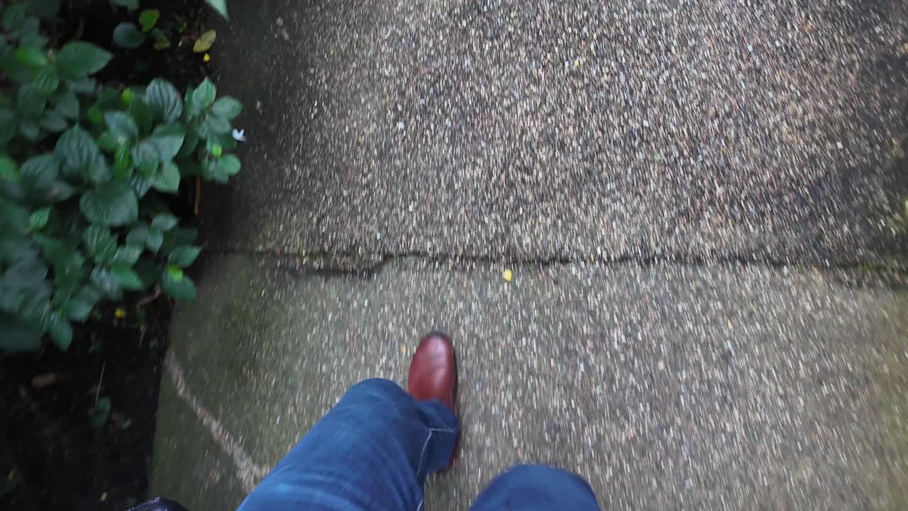 A view of someone walking down stairs