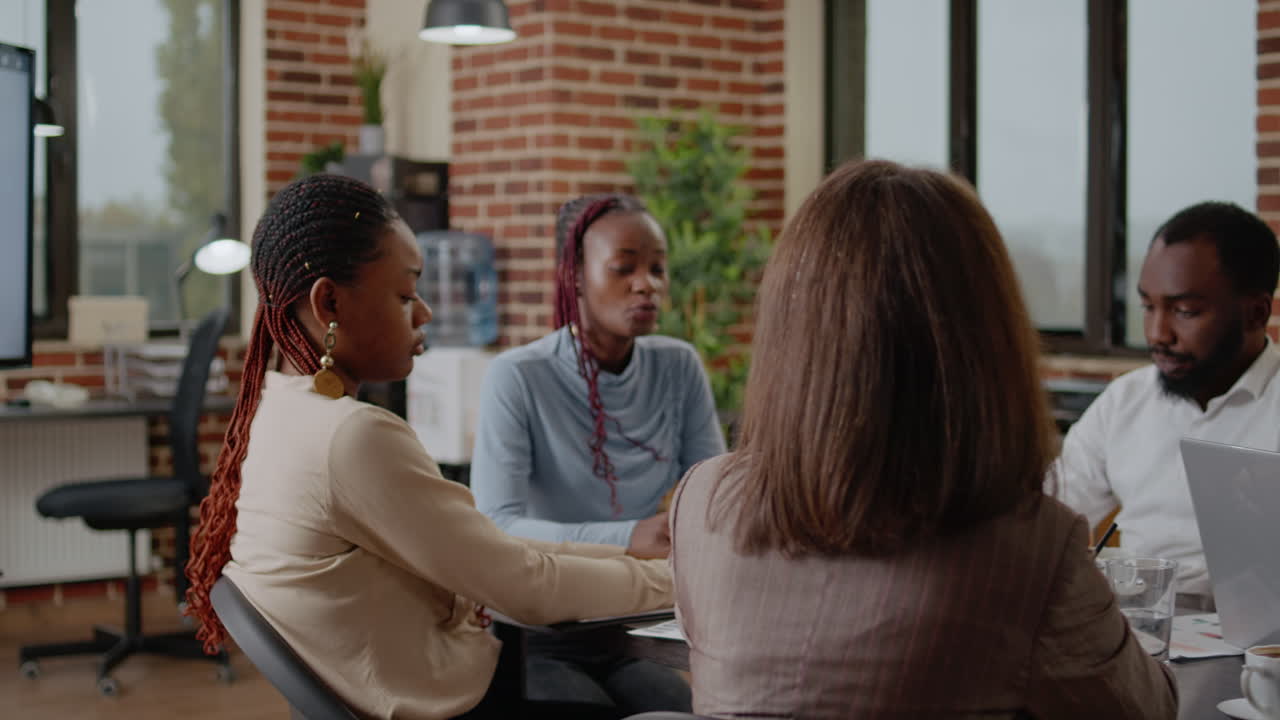 Close up of business woman presenting project ideas
