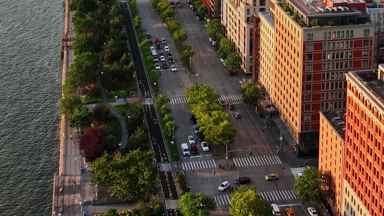 Aerial view of streets and greenery in New York City during sunset
