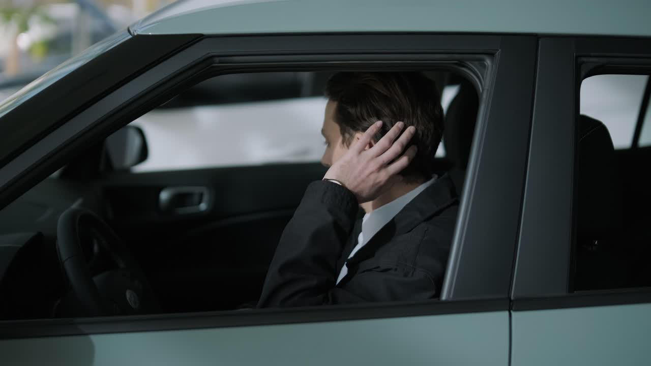 Man getting into a car